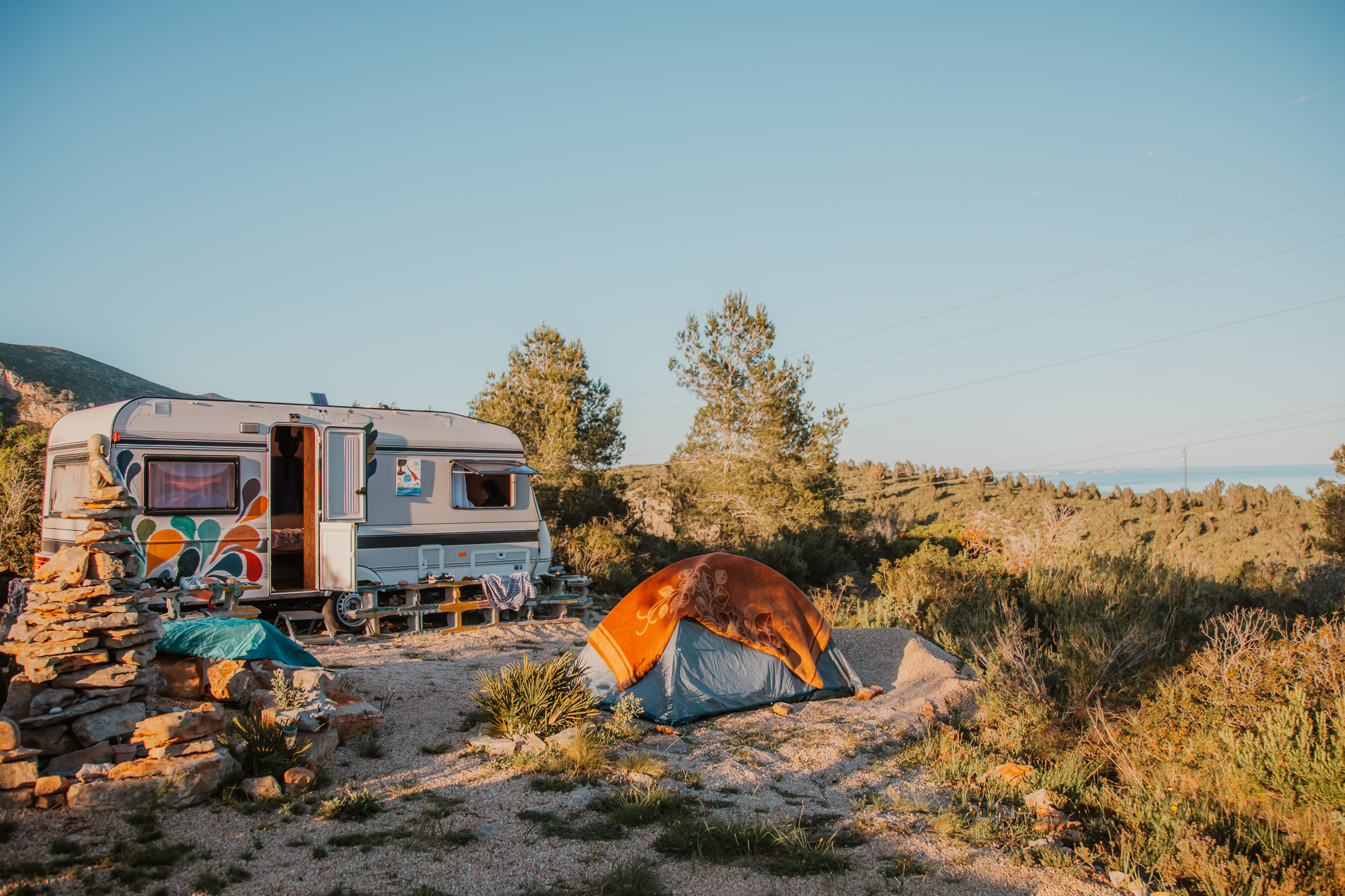 Solar-powered caravan and tent at the retreat